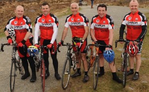 Pedal power: Kerry gardai Mark O'Connor, Dave Callaghan, Stephen Roe and Chief Supt Pat Sullivan with RTE's Paschal Sheehy.  Image: Eamonn Keogh 