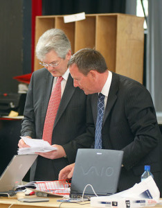 County Registrar Padraig Burke (left) and Philip O'Sullivan checking ballots at a previous election