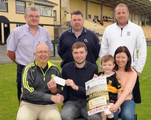 The Dr Crokes GAA Club  British Open Golf Challenge prediction  competition was won by Michael O'Shea pictured receiving the €1,000  first prize from Denis Coleman, Chairman.  Also seated are Brigitte and James Whelan and, standing from left, Ed Stack ,Treasurer, Peter O'Brien (second) and Karl McMahon (third).  Picture: Eamonn Keogh