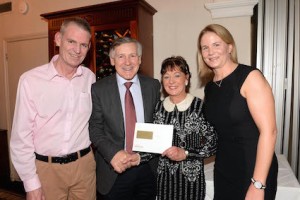 Marina O'Leary receiving the employee of the year award from proprietor Joe Scally, Stephen Quinlan, social committee chairman (left) and and Sinead Marron, deputy general manager (right) Picture: Don MacMonagle 
